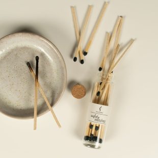 Burned Safety Matches in a Jar